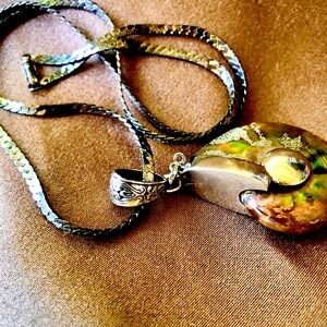 Natural Ammonite Fossil In Secure Stainless Steel Setting on a Black Steel Chain